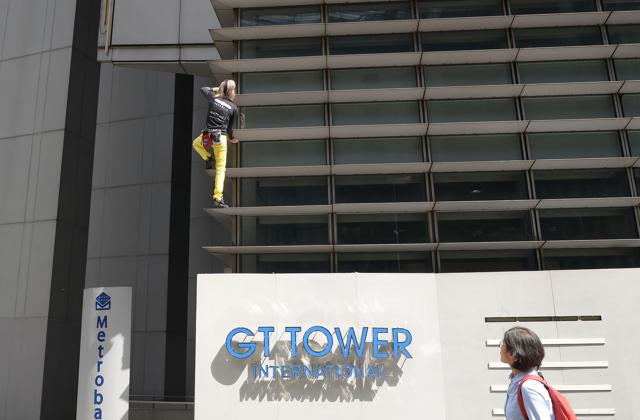 Alain Robert on the side of the GT Tower during his climb. (AFP) Alain Robert on the side of the GT Tower during his climb. (AFP)