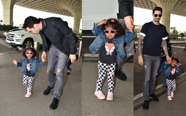 Sunny Leone's daughter Nisha with father Daniel Weber at the Mumbai airoort. (Varinder Chawla) Sunny Leone's daughter Nisha with father Daniel Weber at the Mumbai airoort. (Varinder Chawla)