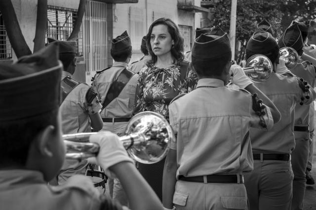 This image released by Netflix shows Marina de Tavira, centre, in a scene from the film Roma, by filmmaker Alfonso Cuaron. (AP) This image released by Netflix shows Marina de Tavira, centre, in a scene from the film Roma, by filmmaker Alfonso Cuaron. (AP)