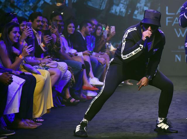 Indian Bollywood actor Ranveer Singh showcases a creation of the "Love Jain" collection during the promotion of his upcoming Hindi film "Gully Boy" at the Lakmé Fashion Week (LFW) Summer Resort 2019. (AFP)