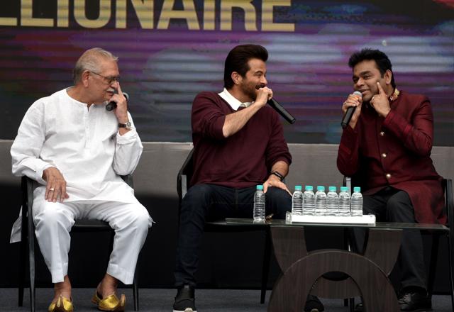 AR Rahman, Gulzar and Anil Kapoor celebrating the 10th anniversary Slumdog Millionaire's big win at 2009 Academy Awards at Kamaraj Memorial English high school at Dharavi in Mumbai. (Satyabrata Tripathy/HT Photo) AR Rahman, Gulzar and Anil Kapoor celebrating the 10th anniversary Slumdog Millionaire's big win at 2009 Academy Awards at Kamaraj Memorial English high school at Dharavi in Mumbai. (Satyabrata Tripathy/HT Photo)