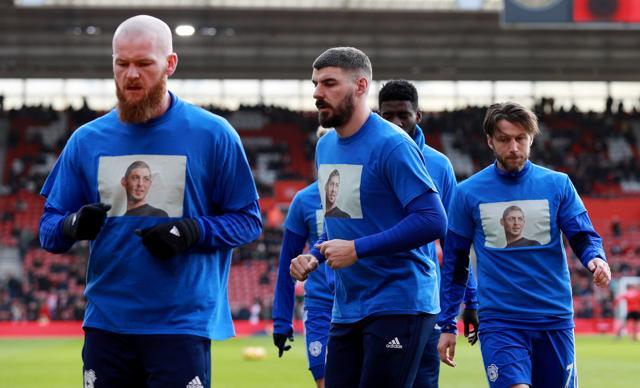 Cardiff City's Harry Arter and team mates wear shirts in remembrance of Emiliano Sala . (REUTERS) Cardiff City's Harry Arter and team mates wear shirts in remembrance of Emiliano Sala . (REUTERS)