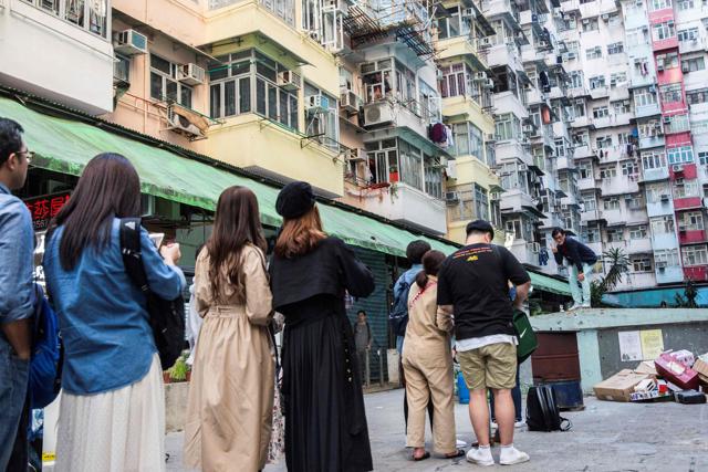 People lining up to take a photo at a popular Instagram spot in Hong Kong. (AFP) People lining up to take a photo at a popular Instagram spot in Hong Kong. (AFP)