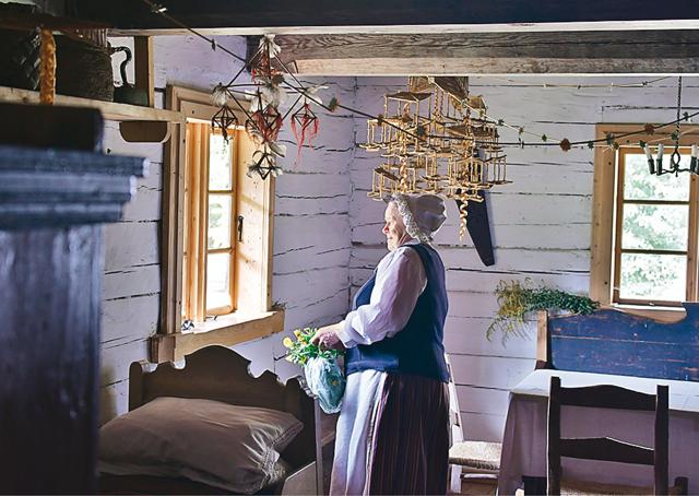 A woman in traditional attire at The Ethnographic Open-Air Museum of Latvia (Saubhadra Chatterji)