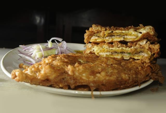 Chicken Kobiraji, a cutlet covered in a layer of egg. Kobiraji, incidentally, is believed to have come from the English word coverage. (SAMIR JANA / HT PHOTO) Chicken Kobiraji, a cutlet covered in a layer of egg. Kobiraji, incidentally, is believed to have come from the English word coverage. (SAMIR JANA / HT PHOTO)