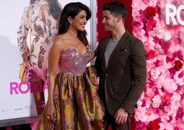 Priyanka Chopra and husband Nick Jonas pose at the premiere for the movie Isnt It Romantic in Los Angeles. (REUTERS) Priyanka Chopra and husband Nick Jonas pose at the premiere for the movie Isnt It Romantic in Los Angeles. (REUTERS)