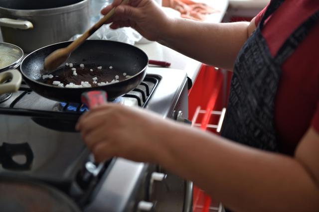 Mexican domestic worker Ignacia Ponciano prepares lunch at the house where she has worked for over 30 years in Mexico City on January 18, 2019. - The working conditions of domestics in Latin America, to whom director Alfonso Cuaron pays homage in his recent movie 'Roma', is slowly reaching a legal framework. Whilst several countries in the region have established laws for the sector in the last decade, other simultaneous realities such as economic crises and migration, are hampering those conquests and ambitions of formality. (Photo by Rodrigo ARANGUA / AFP) (AFP) Mexican domestic worker Ignacia Ponciano prepares lunch at the house where she has worked for over 30 years in Mexico City on January 18, 2019. - The working conditions of domestics in Latin America, to whom director Alfonso Cuaron pays homage in his recent movie 'Roma', is slowly reaching a legal framework. Whilst several countries in the region have established laws for the sector in the last decade, other simultaneous realities such as economic crises and migration, are hampering those conquests and ambitions of formality. (Photo by Rodrigo ARANGUA / AFP) (AFP)