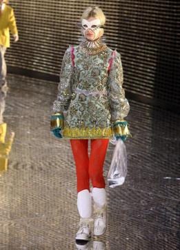 A model presents a creation by Gucci during the Milan Fashion Week, in Milan, Italy, Wednesday, Feb. 20, 2019. (Matteo Bazzi/ANSA via AP) (AP) A model presents a creation by Gucci during the Milan Fashion Week, in Milan, Italy, Wednesday, Feb. 20, 2019. (Matteo Bazzi/ANSA via AP) (AP)