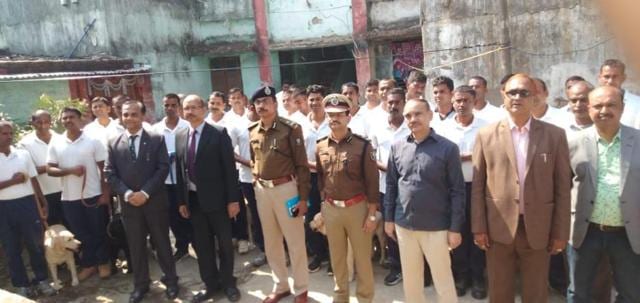 ADG CID and other officials with dogs squads (HT)