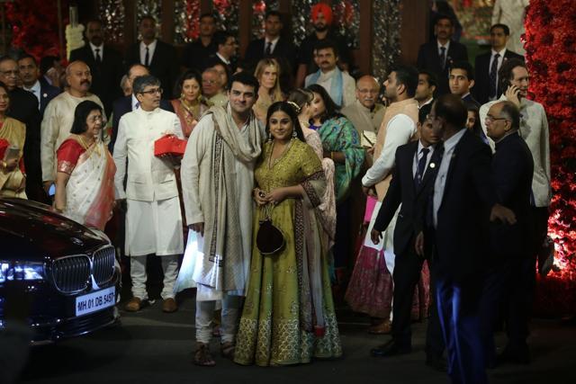 Filmmaker Siddharth Roy Kapur and actor Vidya Balan snapped at the wedding ceremony of Mukesh Ambani's daughter Isha Ambani and Anand Piramal in Mumbai on December 12, 2018. (IANS)