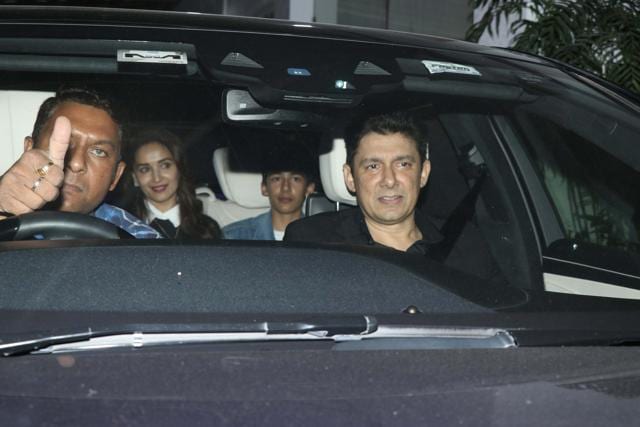Madhuri Dixit with her son Arin and husband Sriram Nene (right) at the screening of Total Dhamaal. (Varinder Chawla) Madhuri Dixit with her son Arin and husband Sriram Nene (right) at the screening of Total Dhamaal. (Varinder Chawla)