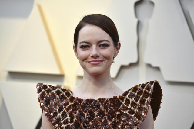 Emma Stone arrives at the Oscars on Sunday. (Jordan Strauss/Invision/AP) Emma Stone arrives at the Oscars on Sunday. (Jordan Strauss/Invision/AP)