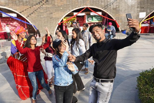 Visitors line up for a selfie post the gastronomical trip. (Gokul VS/HT)