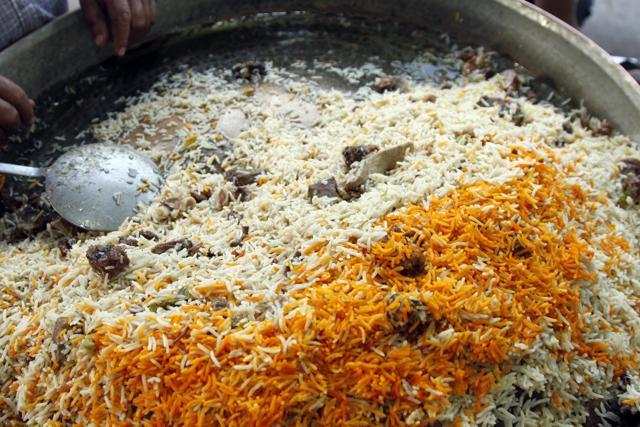 At Haji Nadeem’s shop near Jama Masjid, the biryani is served with biriyan — golden fried rings of onion. (Photo: Waseem Gashroo/HT) At Haji Nadeem’s shop near Jama Masjid, the biryani is served with biriyan — golden fried rings of onion. (Photo: Waseem Gashroo/HT)