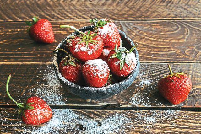 The fruit is usually eaten during the summer with sugar or cream (Shutterstock)