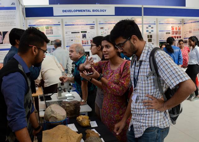 Students at the Agharkar Research Institute’s exhibition were full of questions about objects on display. (Milind Saurkar/HT Photo)