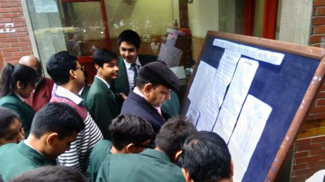 The students and parents check the sitting plan before the class XIIth exam at Mayur Vihar School in New Delhi. (Sushil Kumar/ HT) The students and parents check the sitting plan before the class XIIth exam at Mayur Vihar School in New Delhi. (Sushil Kumar/ HT)