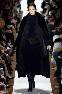 Model Coco Rocha presents a creation by Swiss designer Albert Kriemler as part of his Fall/Winter 2019-2020 women's ready-to-wear collection show for fashion house Akris during Paris Fashion Week. (REUTERS)