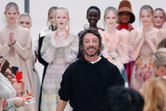 Designer Pierpaolo Piccioli on stage during his Fall/Winter 2019-2020 women's ready-to-wear collection for fashion house Valentino, during Paris Fashion Week. (REUTERS)