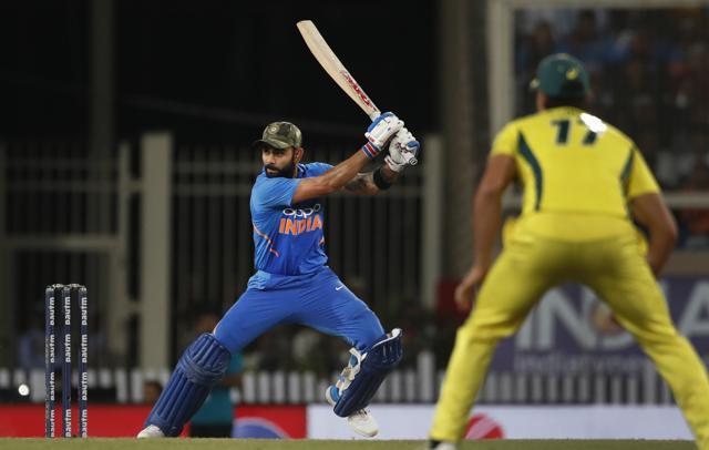 Virat Kohli, left, bats during the third ODI between India and Australia in Ranchi. (AP) Virat Kohli, left, bats during the third ODI between India and Australia in Ranchi. (AP)