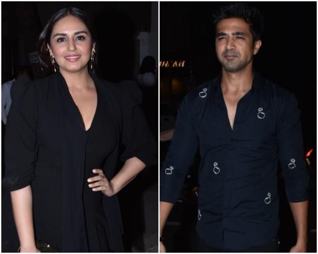Huma Qureshi looks pretty in black while her brother Saqib gives her company in dark blue. Huma Qureshi looks pretty in black while her brother Saqib gives her company in dark blue.