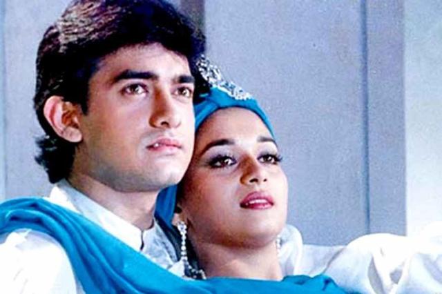 Aamir Khan and Madhuri Dixit in a still from Dil. Aamir Khan and Madhuri Dixit in a still from Dil.