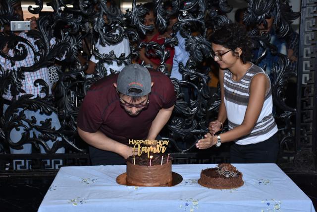 Aamir Khan cuts his birthday cake with wife Kiran.