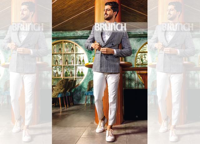 Layer the minimal white trouser-top with a monochromatic blazer. Shirt, jacket and shoes, Unit by Rajat Suri; pants, Amit Wadhwa (Shivamm Paathak)