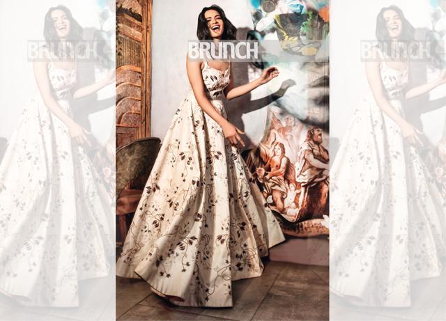 Opt for white gowns and dresses detailed with prints, especially florals in pretty pastel tones. Gown, Sunaina Khera (Shivamm Paathak)