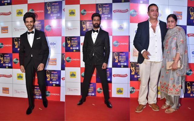 Kartik Aaryan, Vicky Kaushal and his parents Sham Kaushal and Veena at the event. (Varinder Chawla) Kartik Aaryan, Vicky Kaushal and his parents Sham Kaushal and Veena at the event. (Varinder Chawla)