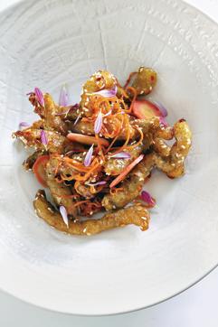 Andrew Wong who also runs Baoshuan in Delhi, cooks dishes like crisp caramelised lamb with chilli and pickled carrots to a high standard