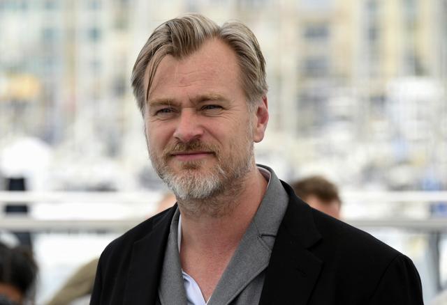 In this May 12, 2018 file photo, director Christopher Nolan poses for photographers during a photo call for Rendezvous with Christopher Nolan. (Arthur Mola/Invision/AP) In this May 12, 2018 file photo, director Christopher Nolan poses for photographers during a photo call for Rendezvous with Christopher Nolan. (Arthur Mola/Invision/AP)