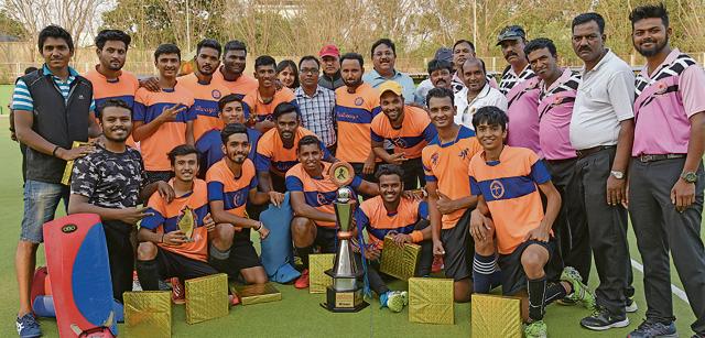 Excellency Academy with their trophy after winning the first edition of the Friendship Cup hockey with a 2-1 victory over Krida Prabodhini at the Major Dhyan Chand Hockey Stadium, Pimpri, on Wednesday. (HT PHOTO)