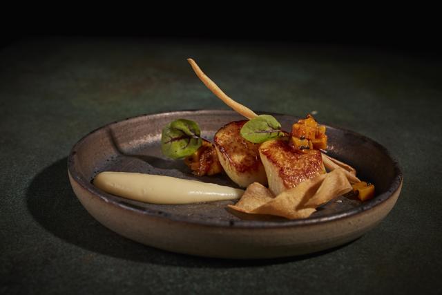 On the menu: Naga Scallops spiced with smoked chilli, served with parsnips achar, puree and papad. (Jodi Hinds Photography) On the menu: Naga Scallops spiced with smoked chilli, served with parsnips achar, puree and papad. (Jodi Hinds Photography)
