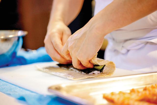 In Japan, sushi is made in front of the guests, making the experience of watching the chef a delight (Alamy Stock Photo)