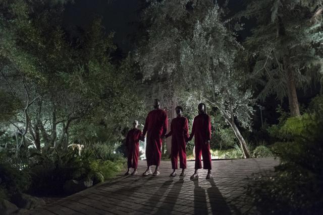 This image released by Universal Pictures shows Evan Alex, from left, Winston Duke, Shahadi Wright Joseph and Lupita Nyong'o in a scene from Us, written, produced and directed by Jordan Peele. (AP) This image released by Universal Pictures shows Evan Alex, from left, Winston Duke, Shahadi Wright Joseph and Lupita Nyong'o in a scene from Us, written, produced and directed by Jordan Peele. (AP)