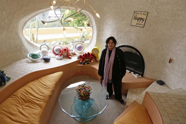 Attorney Angela Alioto looks over a sunken room called "The Happy Place," inside the Flintstone House. (AP) Attorney Angela Alioto looks over a sunken room called "The Happy Place," inside the Flintstone House. (AP)