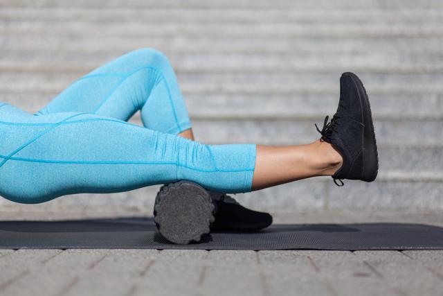 Start foam rolling the calf muscles and or using a tennis ball for a more focused self massage (Shutterstock )