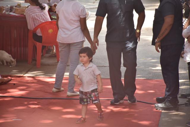 Taimur with his mother on her film’s sets.