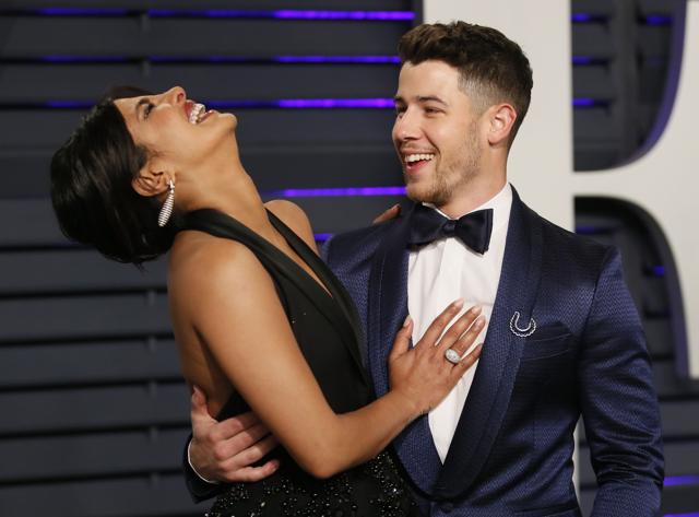 Priyanka Chopra and Nick Jonas at the Vanity Fair Oscars party. (REUTERS) Priyanka Chopra and Nick Jonas at the Vanity Fair Oscars party. (REUTERS)