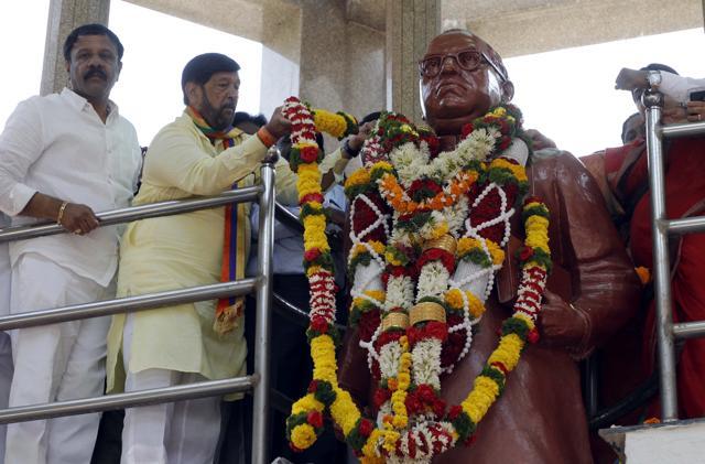 Girish Bapat at Ambedkar Statue, Pune Railway station, on Sunday. (Rahul Raut/HT PHOTO)