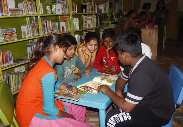 Children of Sikanderpur village at the community library. (Yogendra Kumar/HT PHOTO) Children of Sikanderpur village at the community library. (Yogendra Kumar/HT PHOTO)