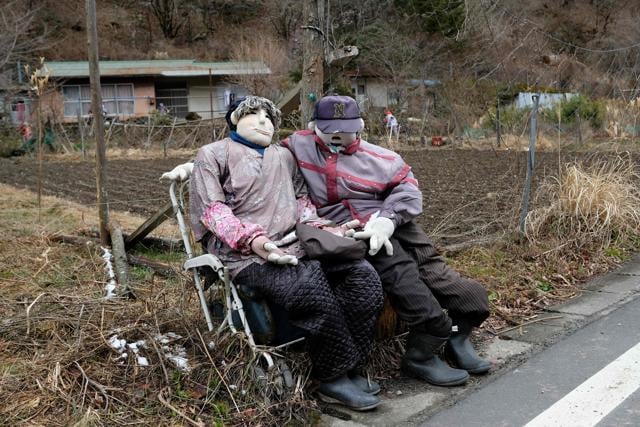 Dolls sitting by a roadside in the tiny village of Nagoro. (AFP) Dolls sitting by a roadside in the tiny village of Nagoro. (AFP)