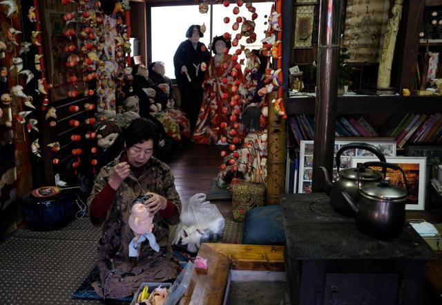 Tsukimi Ayano making the head of a life-size doll at her house in the tiny village of Nagoro. (AFP) Tsukimi Ayano making the head of a life-size doll at her house in the tiny village of Nagoro. (AFP)