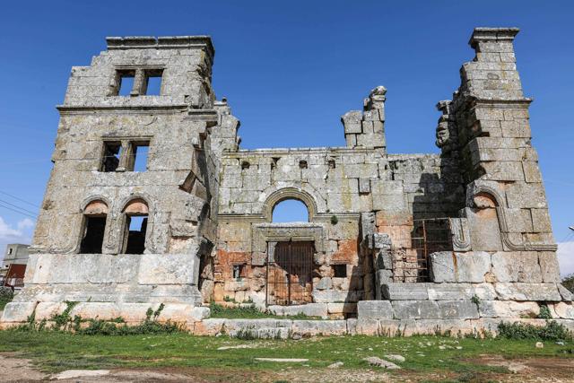 A picture taken on April 18, 2019 shows the facade of the 5th century basilica in Qalb Lozeh village in northwestern Syria. (AFP) A picture taken on April 18, 2019 shows the facade of the 5th century basilica in Qalb Lozeh village in northwestern Syria. (AFP)