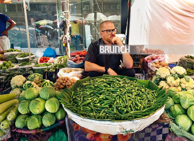 Heston takes the vendor’s seat to browse through fresh green chillies and okra amongst other veggies (Rohit Chawla) Heston takes the vendor’s seat to browse through fresh green chillies and okra amongst other veggies (Rohit Chawla)
