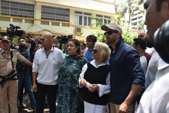 Hrithik Roshan and father Rakesh Roshan near the polling station. Hrithik Roshan and father Rakesh Roshan near the polling station.