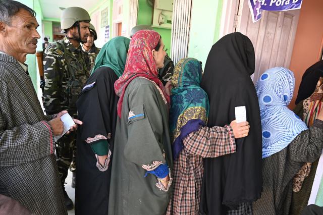 People queue up to cast their vote at a polling station at Damhal Hanjipora Kulgam district on April 29, 2019. (AFP) People queue up to cast their vote at a polling station at Damhal Hanjipora Kulgam district on April 29, 2019. (AFP)