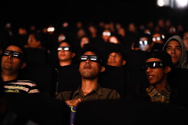 Venezuelan filmgoers watch the first screening in Venezuela of Marvel Studios' Avengers: Endgame. (AFP) Venezuelan filmgoers watch the first screening in Venezuela of Marvel Studios' Avengers: Endgame. (AFP)