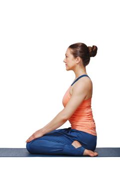 Sit on your shins, with your insteps touching the floor for relieving pain (Shutterstock) Sit on your shins, with your insteps touching the floor for relieving pain (Shutterstock)